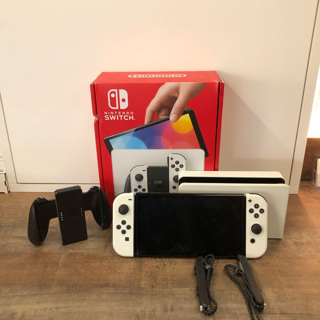 Nintendo Switch Oled avec boîte et accessoires