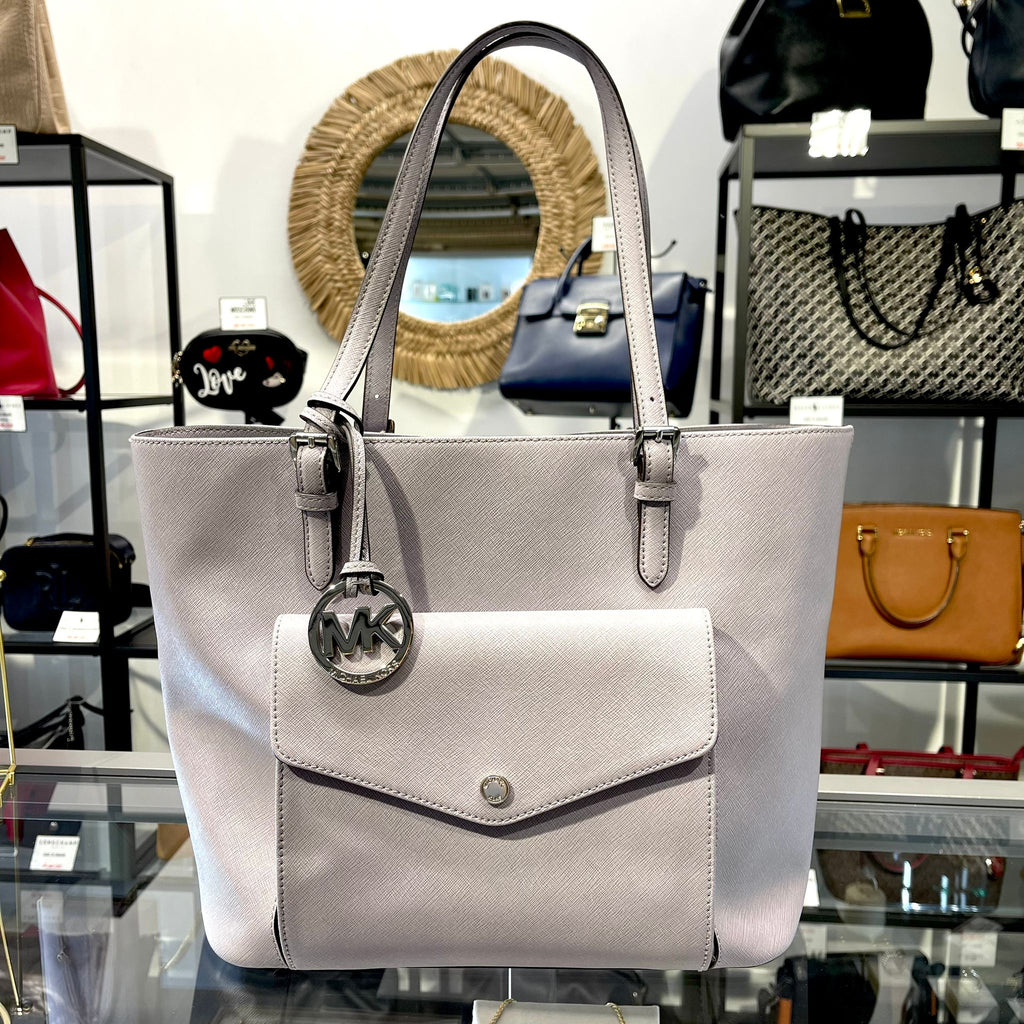 Sac a main Michael Kors couleur lilas,