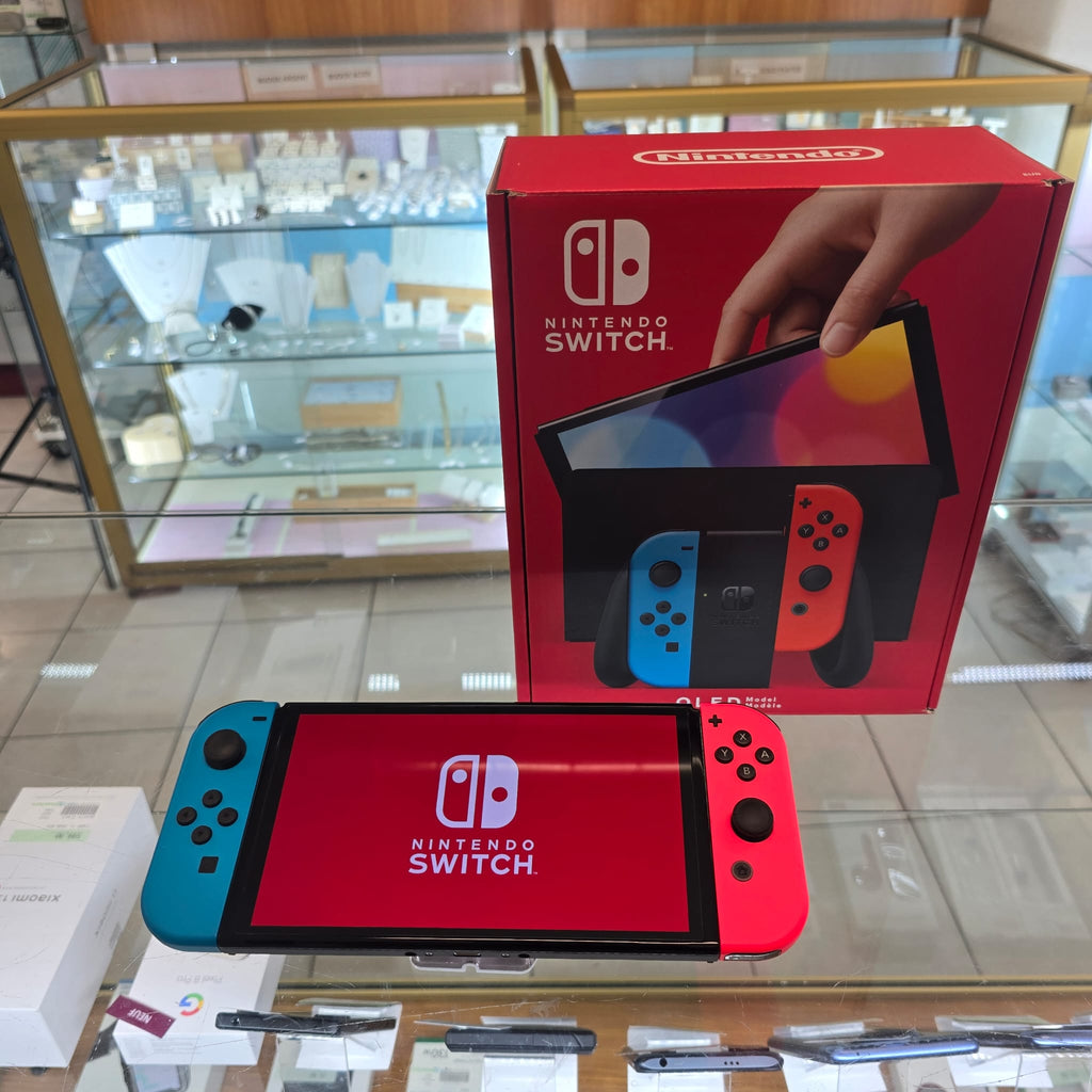 Console Switch OLED rouge et bleu néon - avec boîte