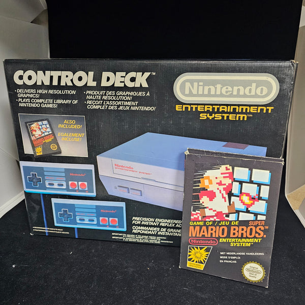 Console Nintendo nes Deux manettes + mario bros