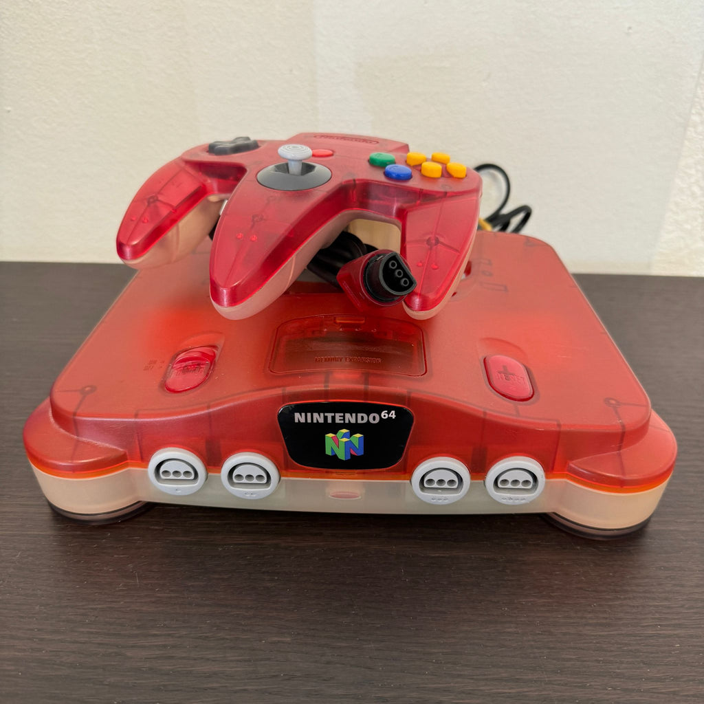 CONSOLE NINTENDO 64 + MANETTE ROUGE TRANSPARENTE JAPONAISE